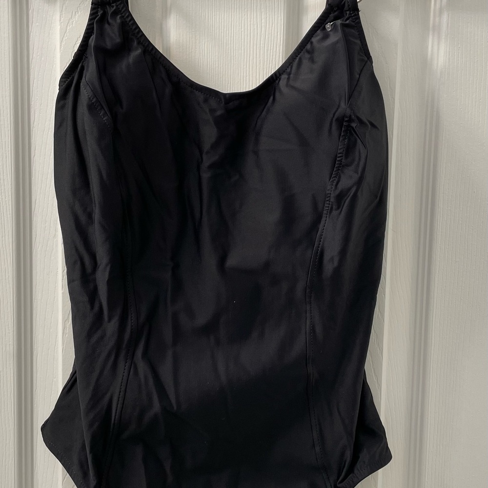 Brand new with tags One piece bathing suit size 10 and 14